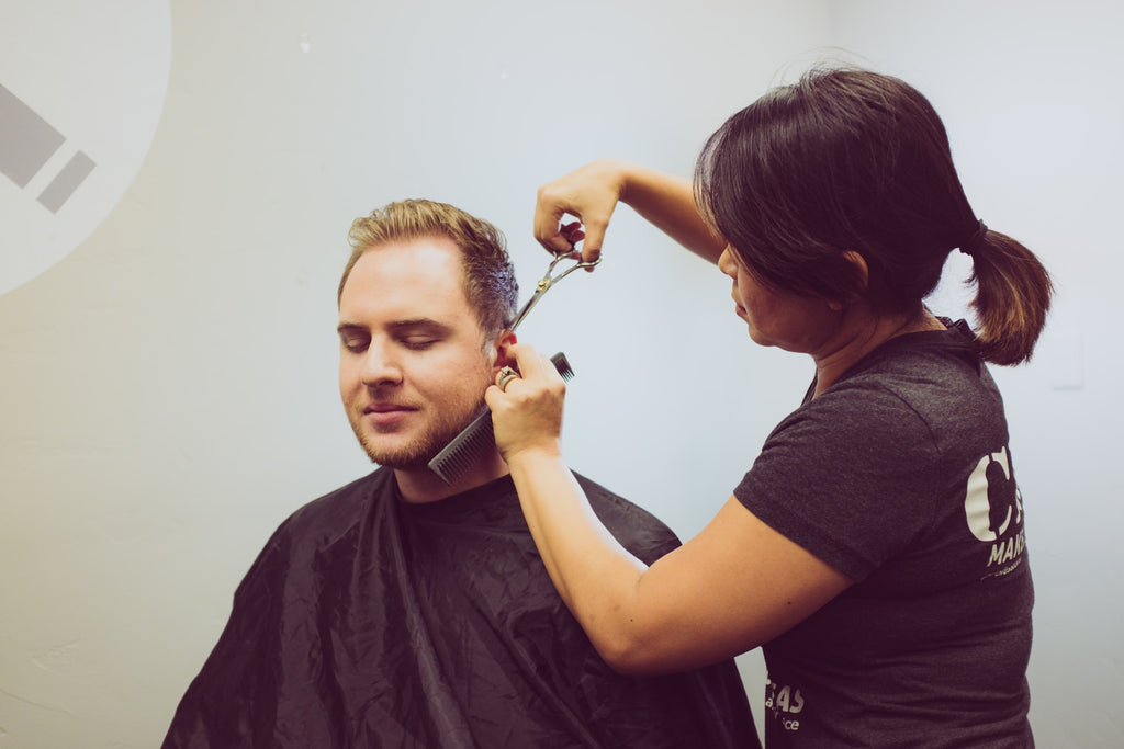 man getting a haircut